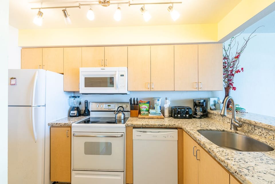 This delightful kitchen has everything you need to cook up a perfect meal.