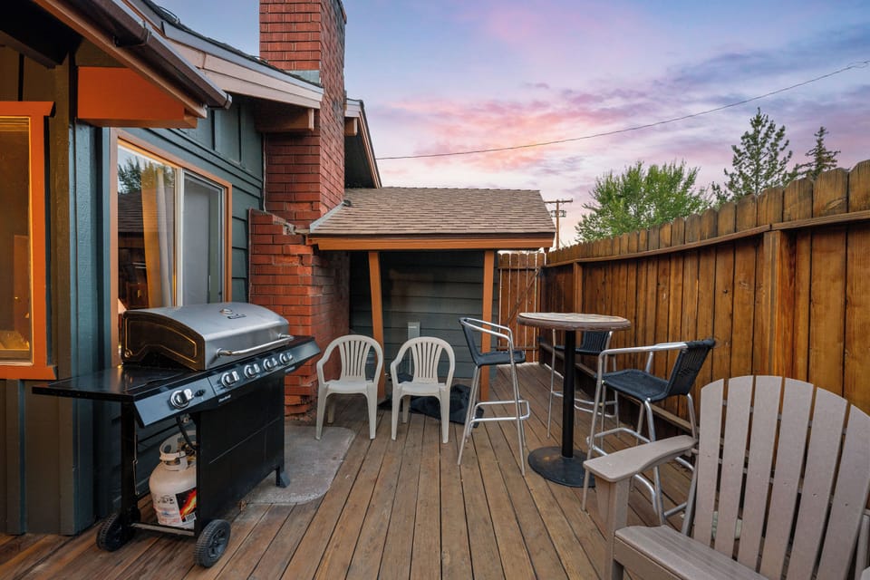 Deck - Hot tub located on back deck with high wood fence for privacy.