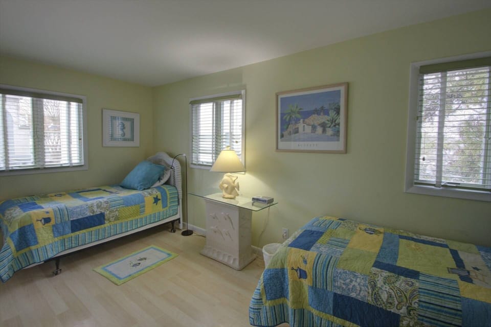 Bedroom #4 on the 3rd floor with two twins, shares the full bath with bedroom #3.
