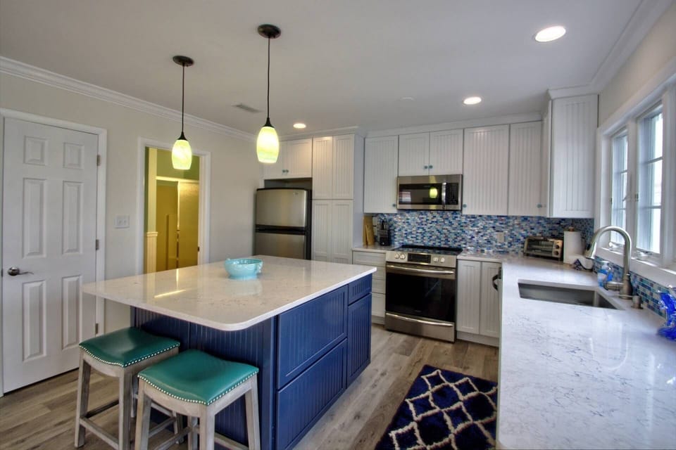 You'll love cooking with the family in this remodeled kitchen.
