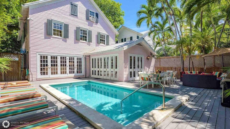 STAR OF THE SEAPORT is a luxurious five bedroom private estate located in the Historic Seaport District, just a block from Duval Street...