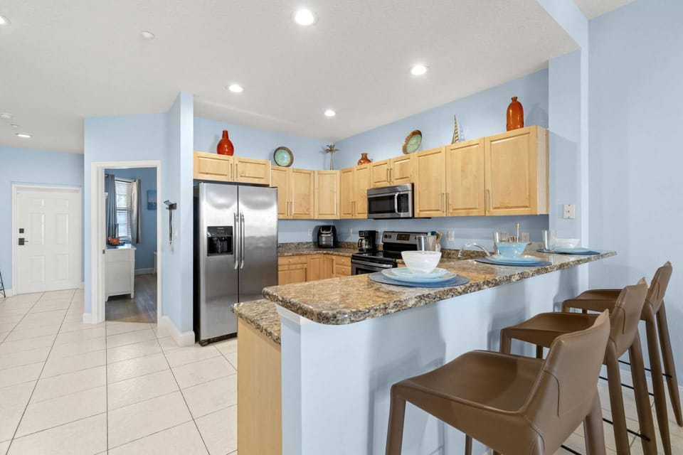 Fully Equipped Kitchen with Granite Countertops, Stainless Steel Appliances, and All the Conveniences of Home!