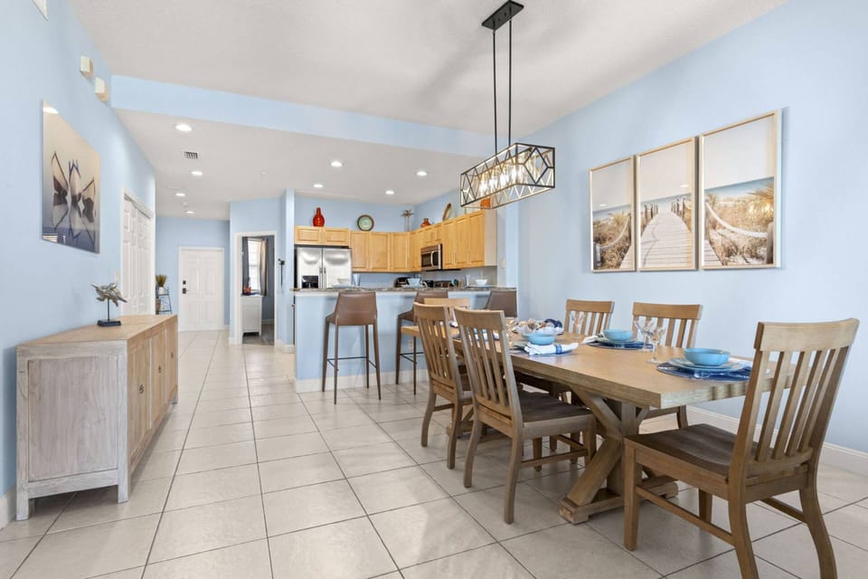 Dining Table and Breakfast Bar Offer Plenty of Seating for the Whole Family!