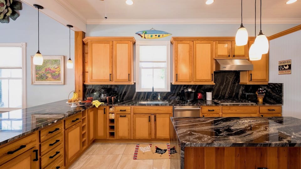 The spacious kitchen is fully equipped with everything needed to prepare meals from home...