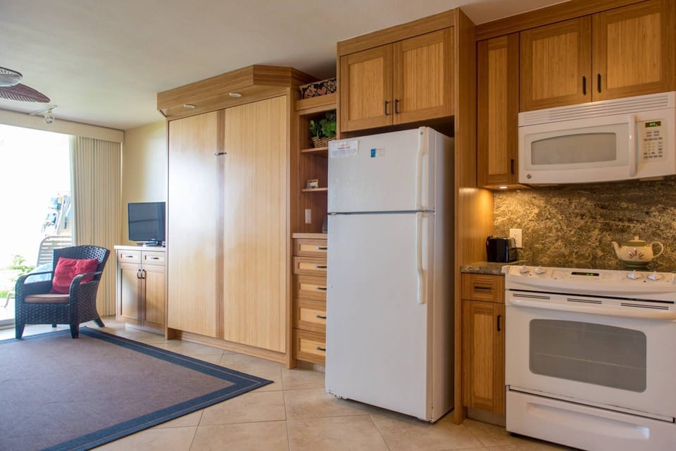 Full sized appliances in upgraded kitchen.