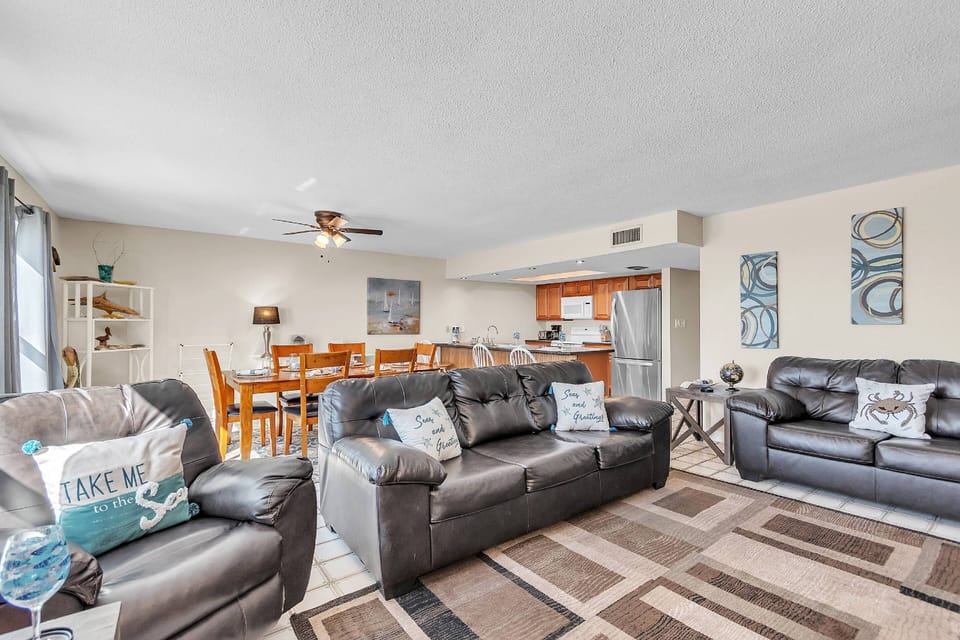 Living Room with Sofa, Loveseat, and Armchair