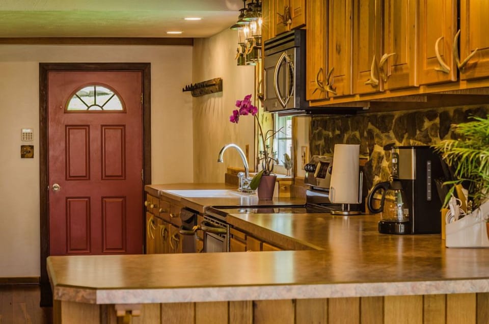 Kitchen - Main Level. Cozy type stocked kitchen with full sink, boiler and coffee maker.