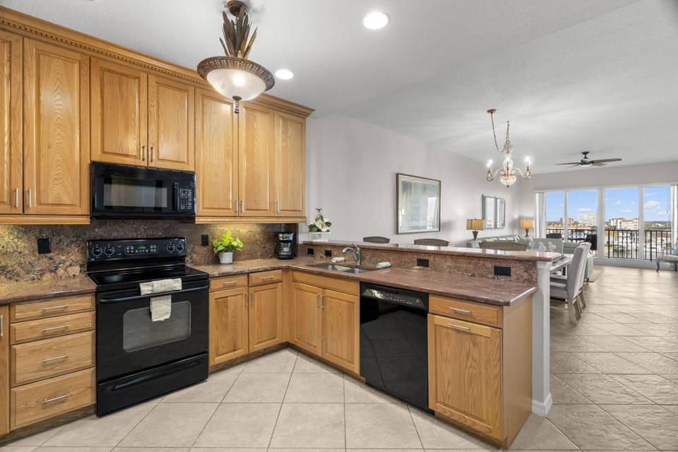 Kitchen Breakfast Bar Opens to the Rest of the Main Living and Dining Space