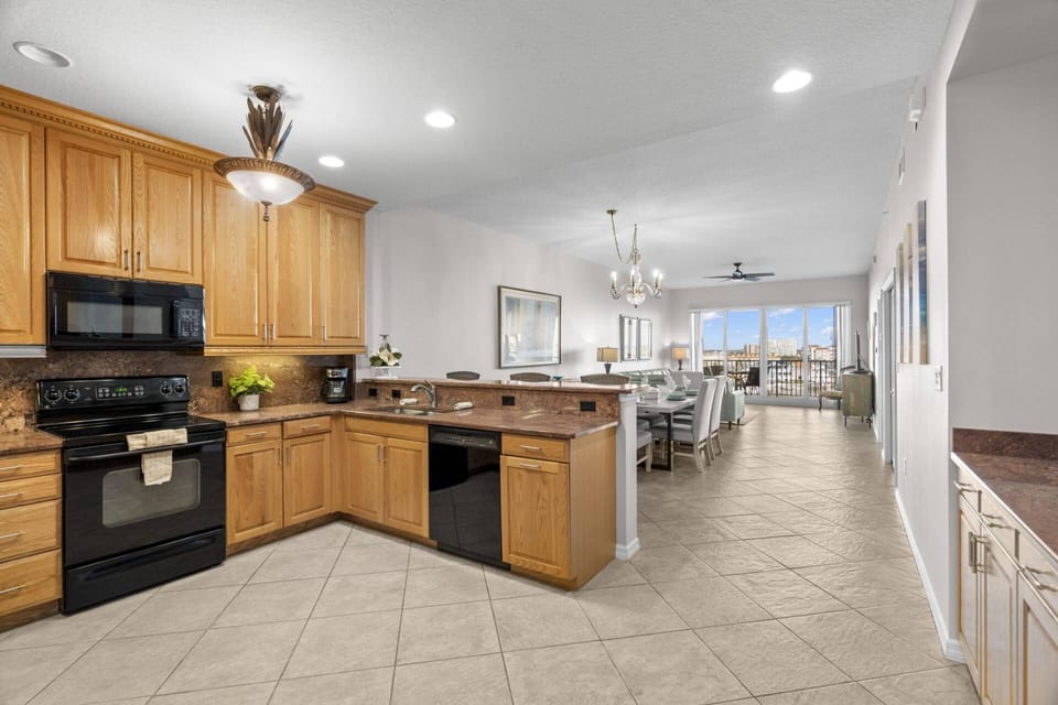 Kitchen Breakfast Bar Opens to the Rest of the Main Living and Dining Space