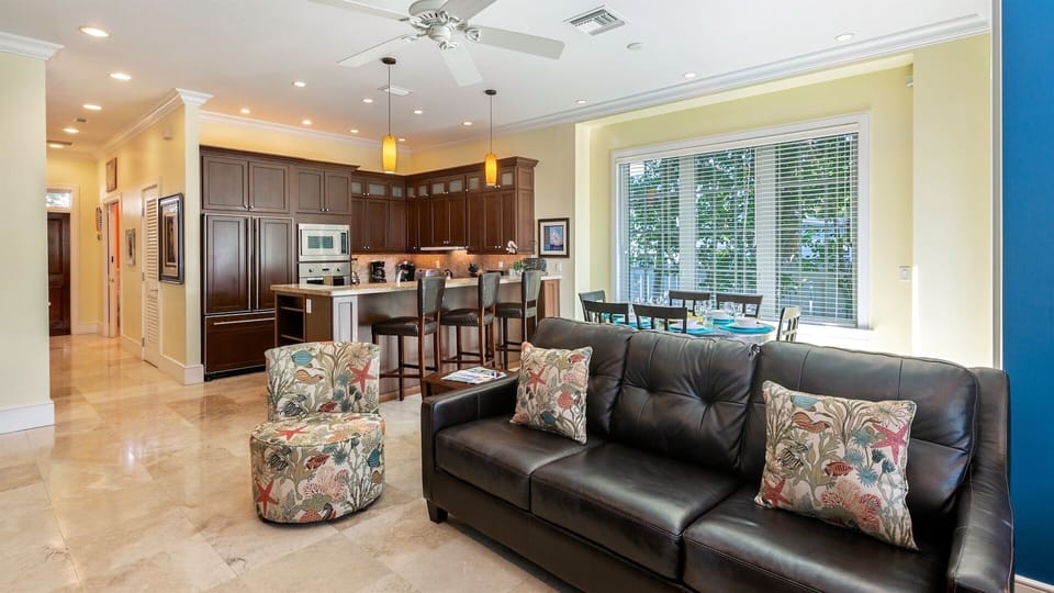 Floor to ceiling windows allow natural light to pour into the first floor all day...
