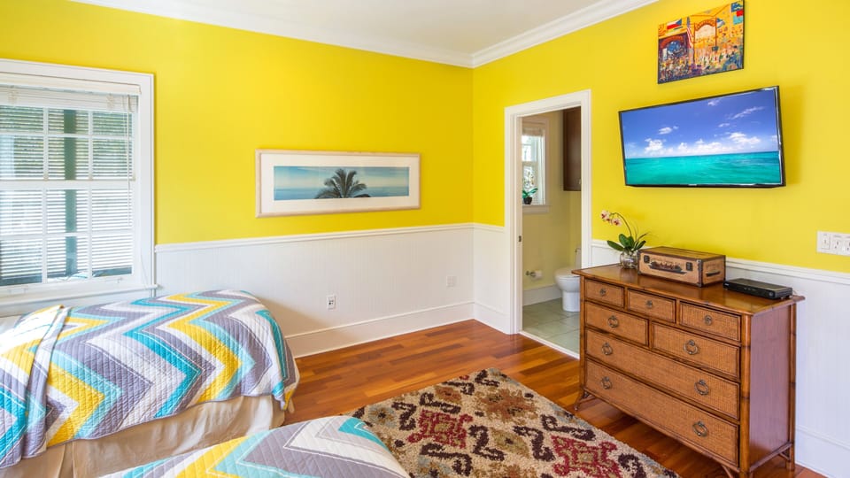 The third bedroom has a flat screen TV and an en-suite bathroom...