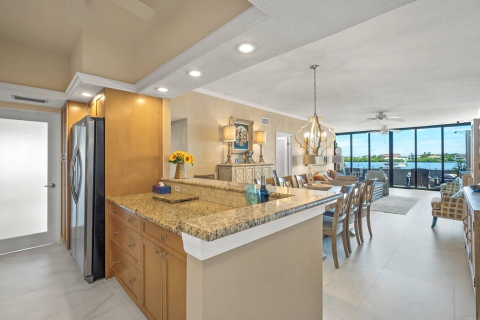 The open living room/kitchen, dining room area makes it easier to entertain guests.