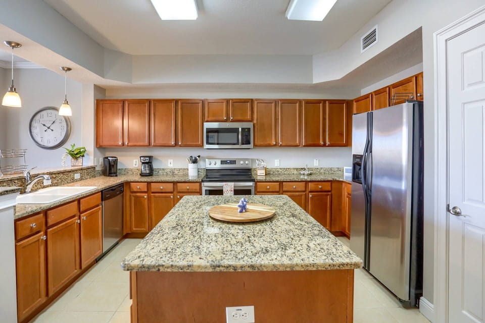 Gourmet Kitchen with Large Island, Granite Countertops and Stainless Steel Appliances