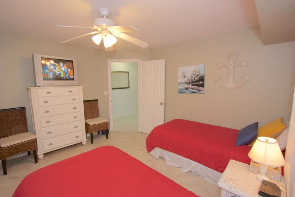 Let the kids or guests wind down and enjoy the twin beds and flat screen TV in this cozy guest bedroom