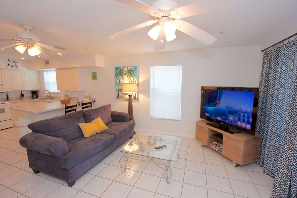 Watch a movie on  the flat screen TV, put your feet up and relax while enjoying a scenic gulf front view from the couch in this lovely living area