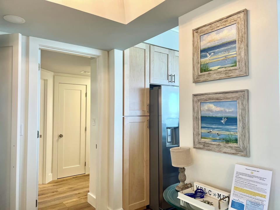 View toward master suite and to the right the kitchen