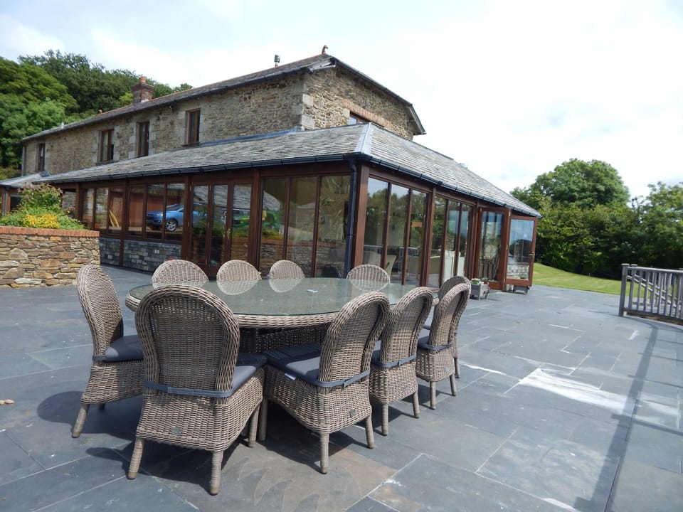 High quality outdoor furniture is provided on the patio