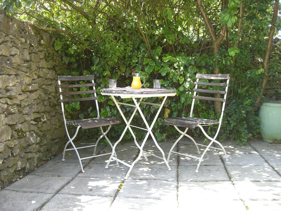 Private south-facing walled patio. 