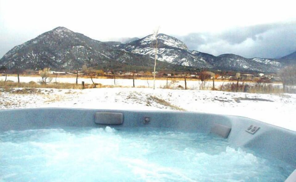 Private hot tub with mountain views
