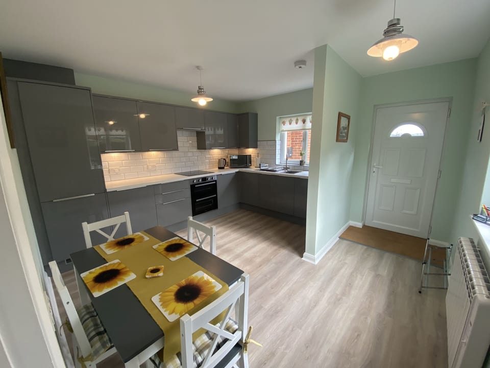 Refurbished kitchen, with integrated dishwasher and washer dryer