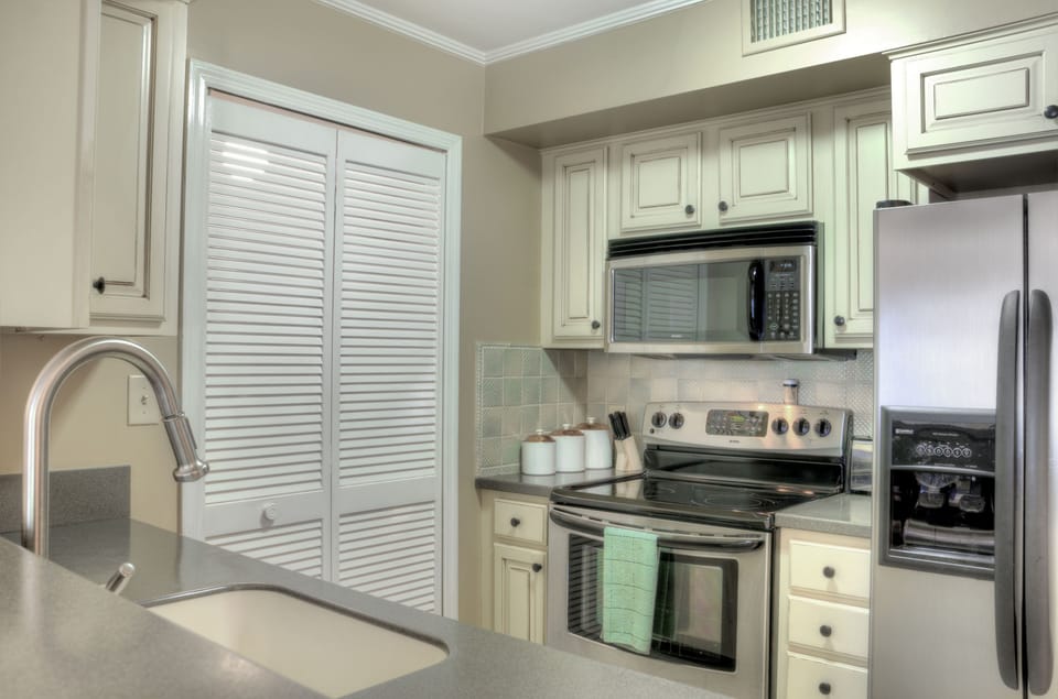 Full Kitchen with Stainless Appliances - Kitchen with full-size appliances, coffee maker, dishwasher, and the main prep area for meals at home.