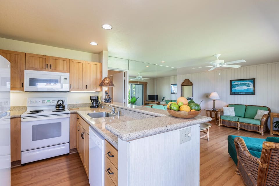 Kitchen is fully equipped with pots, pans and appliances