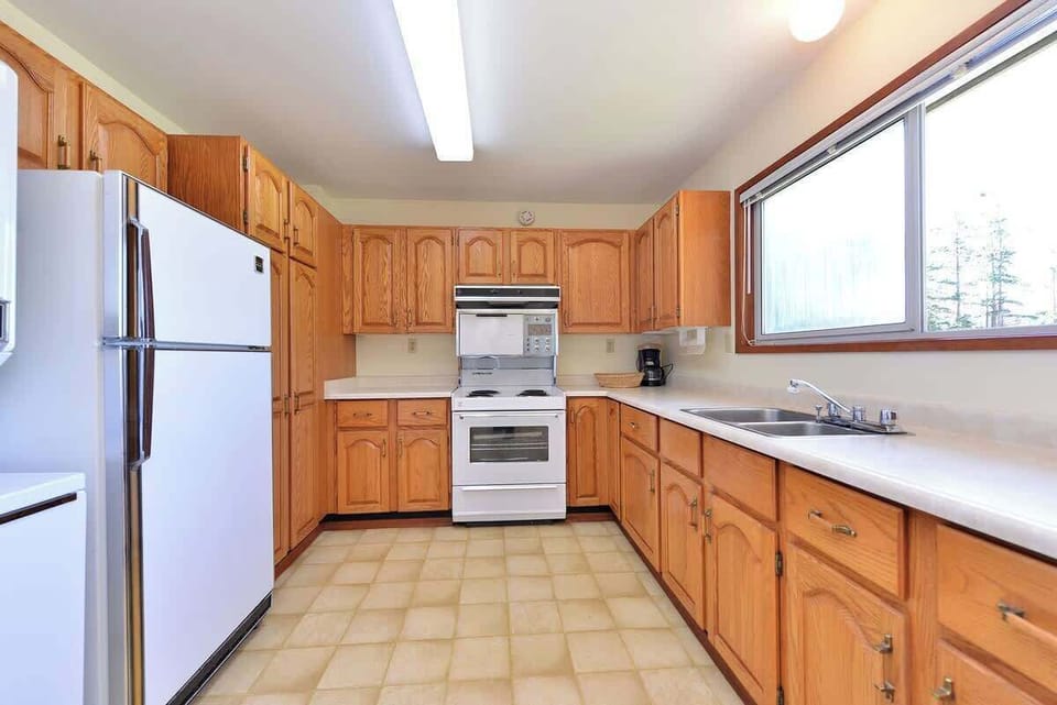 Fully equipped modern kitchen in the attached suite.