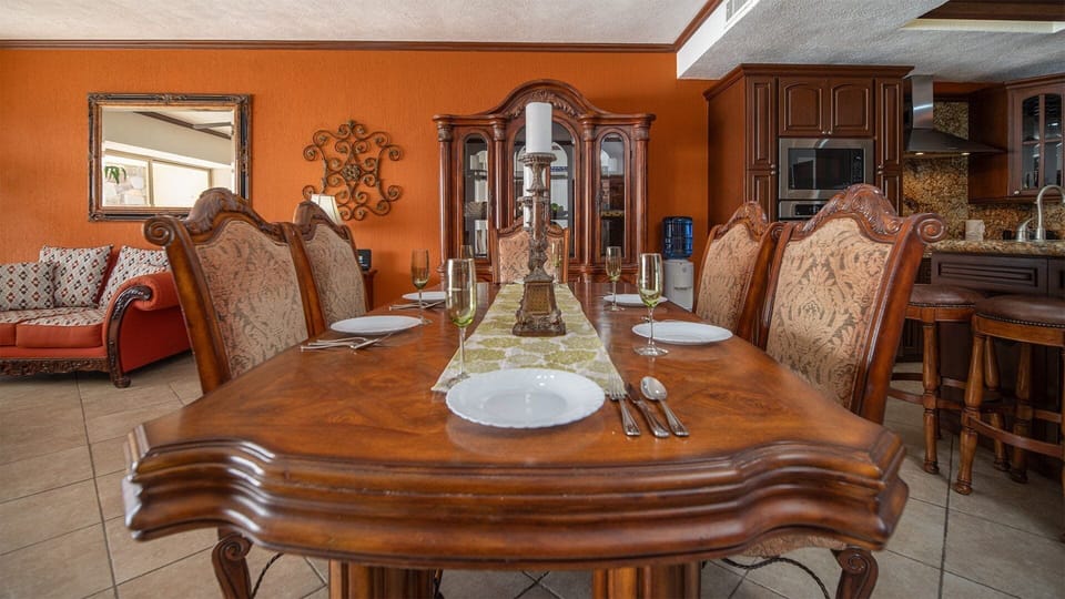 Six can be seated at the classic dining table.