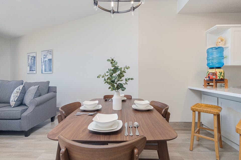 The dining table seats four comfortably.