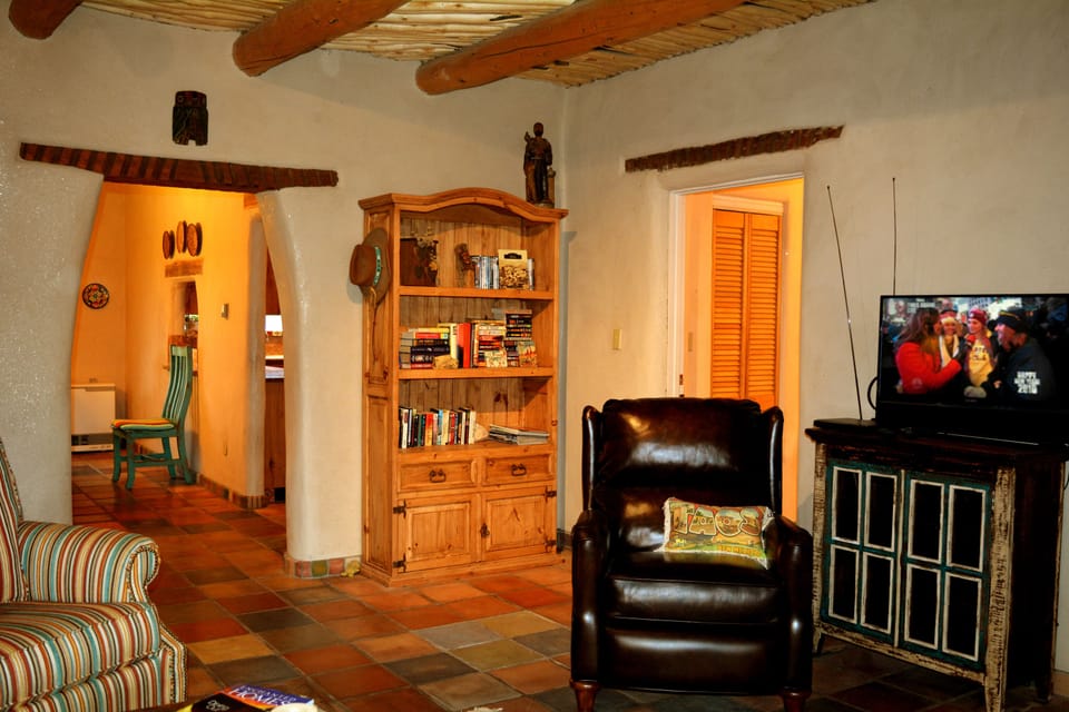Living room view to large dining room and glimpse into kitchen
