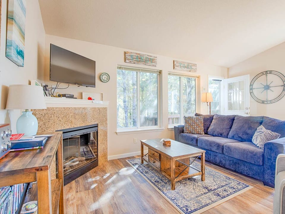 Living Area -  cozy up around the fireplace and watch a movie