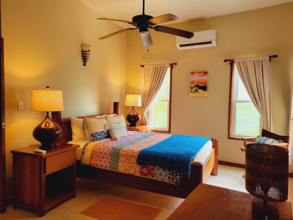 Third bedroom with queen bed and detached bathroom, access through private door