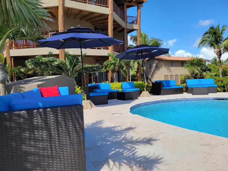 Lounge chairs on pool deck area