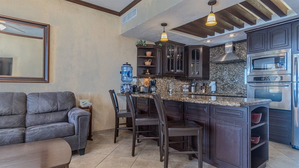 Additional seating at the kitchen counter.