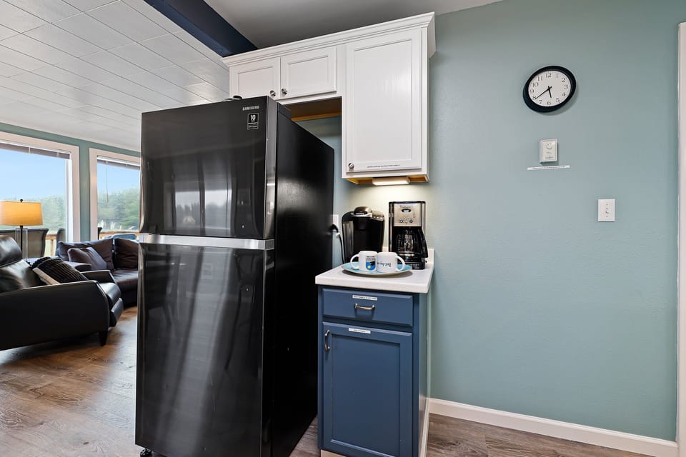 The kitchen comes fully equipped to meet all your culinary needs.