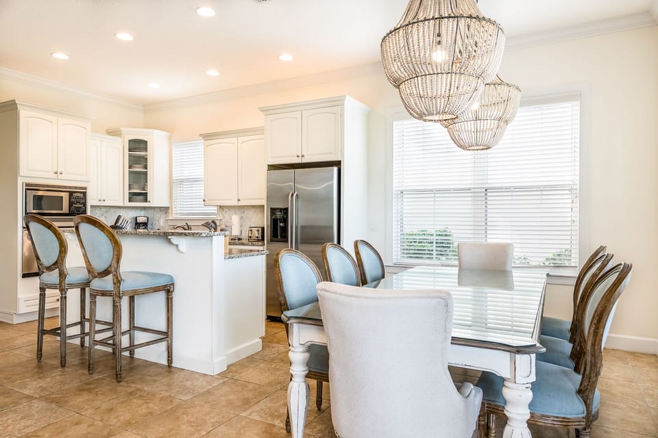 Fully equipped granite kitchen with 8 seat dining table and 2 seat breakfast bar