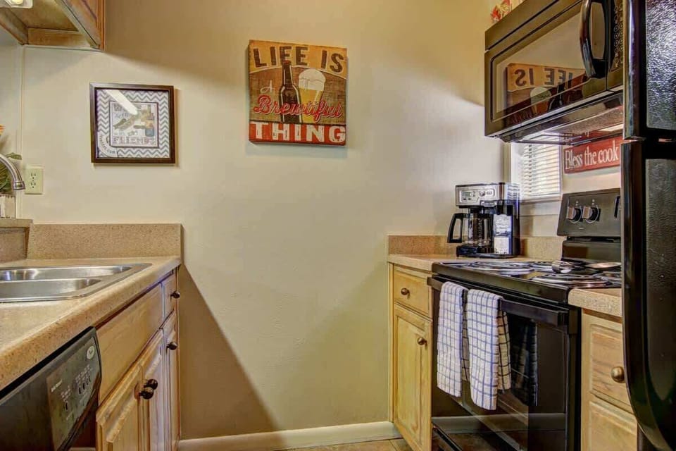 The full kitchen comes stocked with all the pots, pans, plates, bowls, and utensils that you should need.