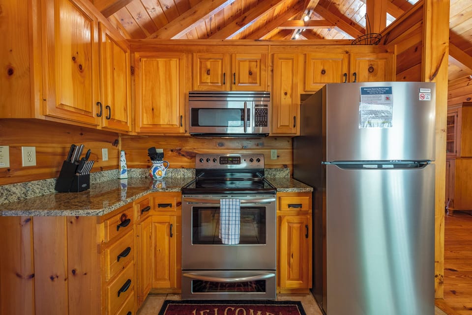 Kitchen with dishwasher & drip-style coffeemaker.