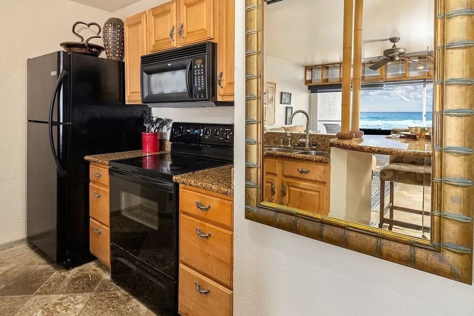 Kitchen with an oven and a refrigerator