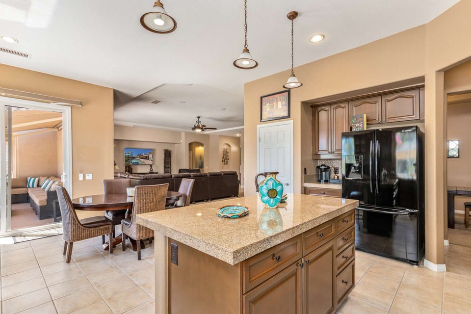 Kitchen opens to dining and living areas