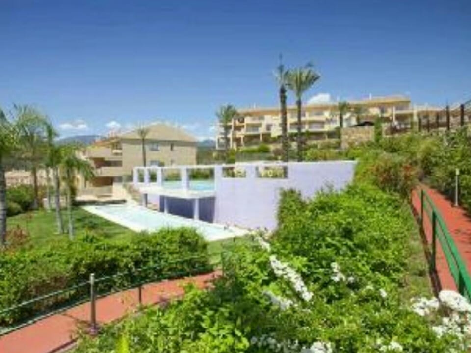 Waterfall swimming pools with stunning tropical garden surroundings