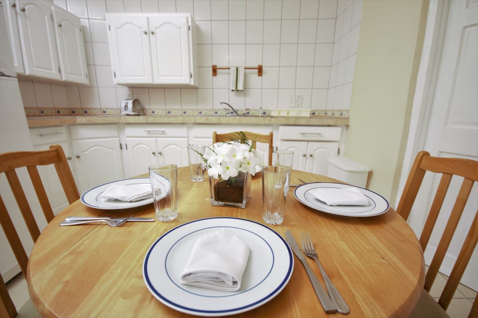 Dining area seating for four people.