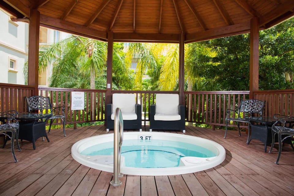 Hot tub under the gazebo. perfect spot for an evening cocktail. 