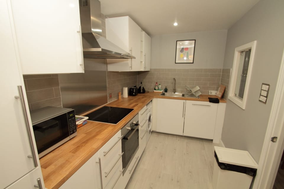 New kitchen (Oct 16)- well equipped with toaster, microwave, kettle, utensils..