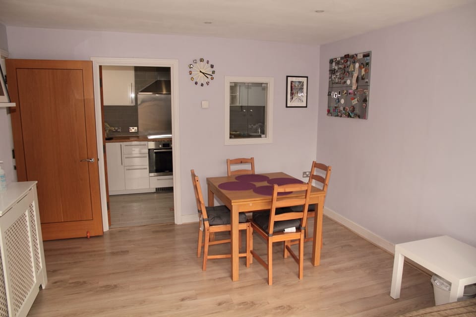 Dining area - the table can be extended to accommodate six people.