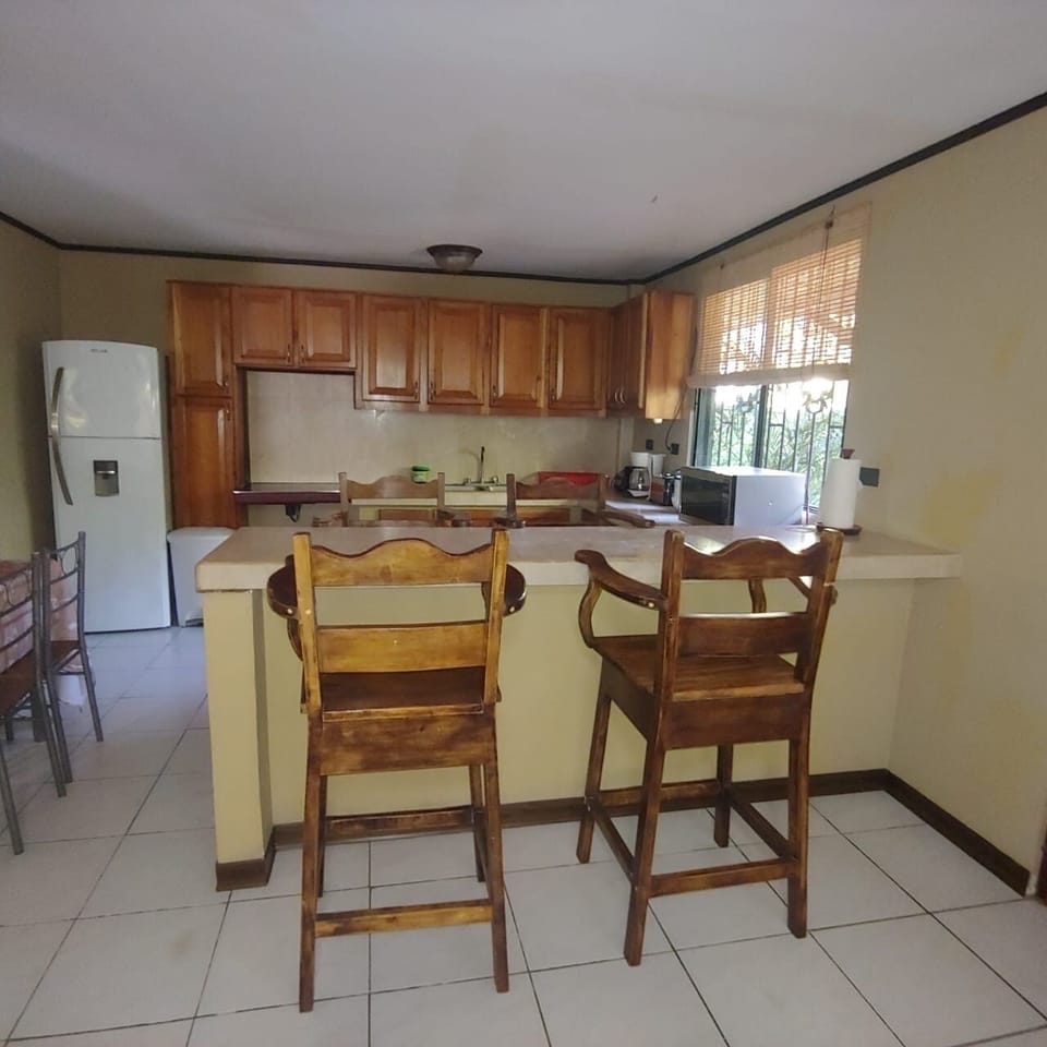 The Fully equipped kitchen from the living room.