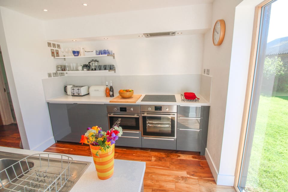 Another view of the kitchen area