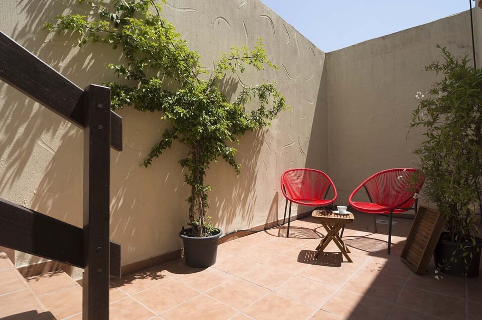 Downstairs has its own small courtyard