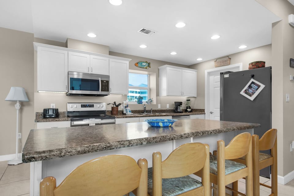 Socialize while you cook with the eat-in kitchen island