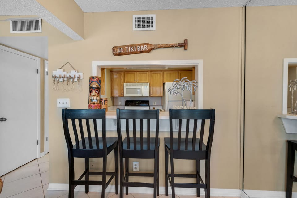 Built in bar with seating for 3